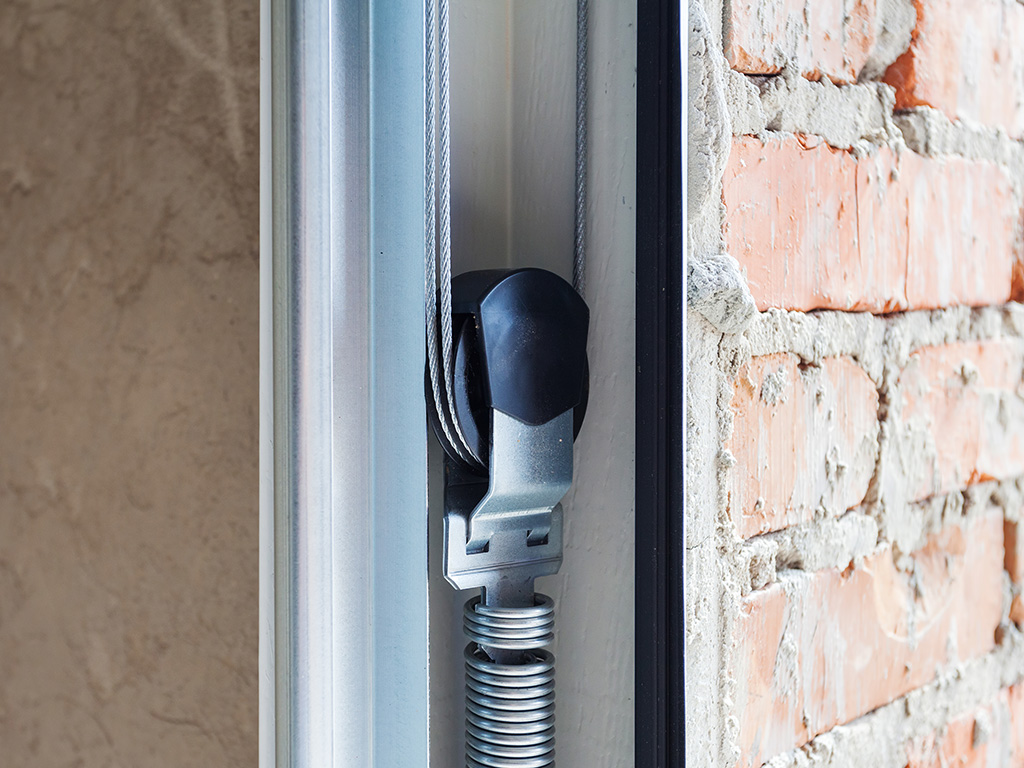 Garage Door Spring and Cable in Need of Repair
